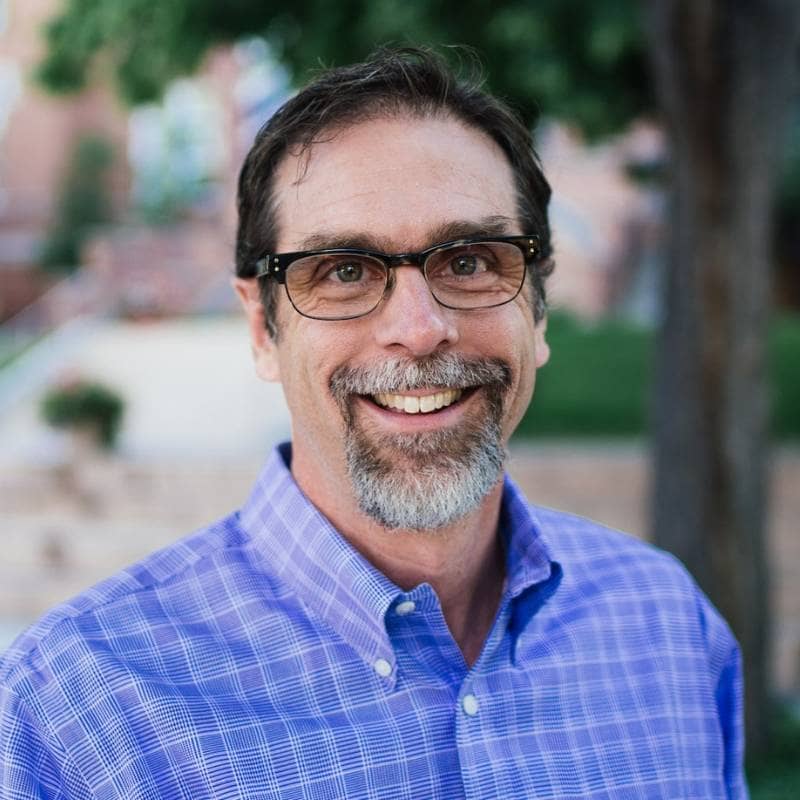 Steve Goldring Blue Shirt Head Shot 800X800